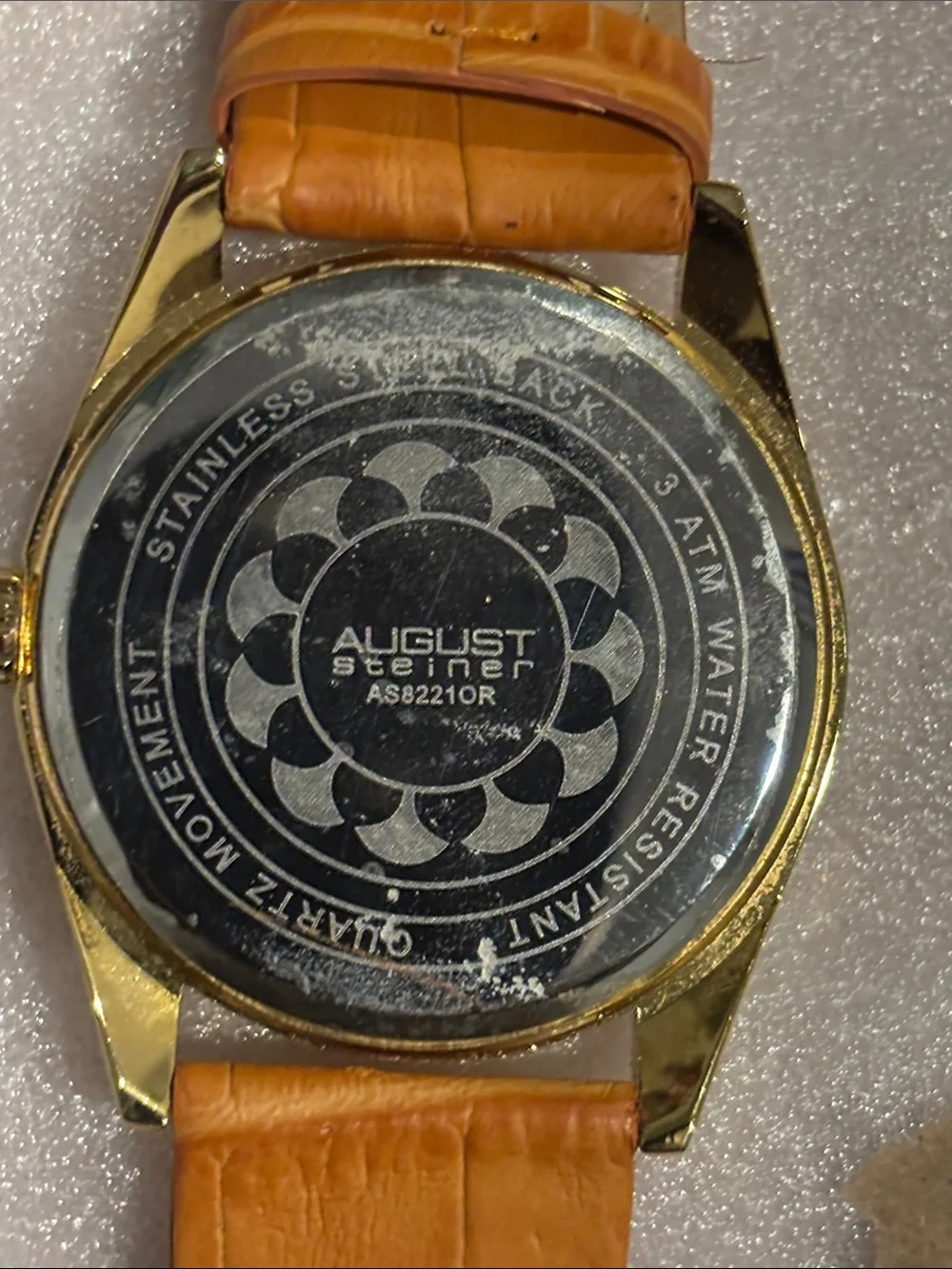 August Steiner Gold Case Silver Dial Watch with Orange Leather Strap